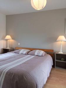 Postel nebo postele na pokoji v ubytování Maison Béniguet au Pays des Abers