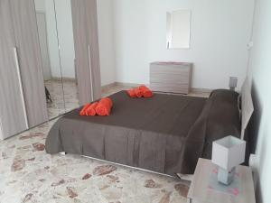 A bed or beds in a room at Casa Angelica