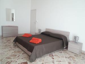 A bed or beds in a room at Casa Angelica
