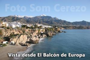 a view of a beach with a town and mountains at Acapulco playa Nerja 407 planta superior in Nerja