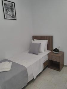 Postel nebo postele na pokoji v ubytování HARA BEACH