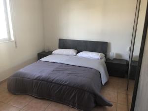 Ein Bett oder Betten in einem Zimmer der Unterkunft Casa Sunshine - Casa Vacanze al mare
