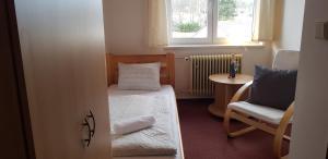 Katil atau katil-katil dalam bilik di Hotel Rohanov