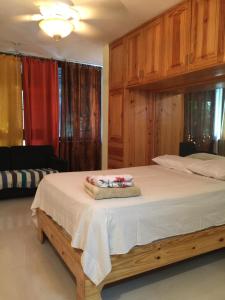 Postel nebo postele na pokoji v ubytování Terraza del Caribe