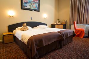 Letto o letti in una camera di Hotel Grupello