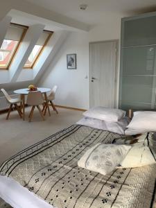 Postel nebo postele na pokoji v ubytování Residence Sarka