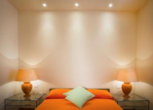 A bed or beds in a room at Le Residenze a Firenze - Residenza Covoni Apartment in the historical center of Florence
