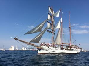 a group of people on a sail boat in the water at L'Imprenable vue mer in Crozon