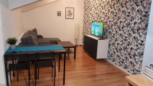 Телевизия и/или развлекателен център в MJ Apartament Spokojna