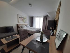 Μια τηλεόραση ή/και κέντρο ψυχαγωγίας στο TeonaLux Milmari Resort P84