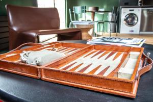 a wooden tray on top of a table at Prestigieux Appartement Pied Piste Luc Alphand 80 M2 Serre Chevalier Chantemerle in Saint-Chaffrey