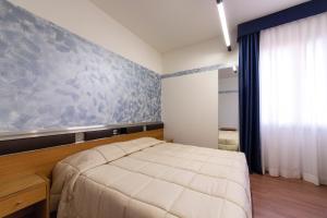 Postel nebo postele na pokoji v ubytování Park Hotel