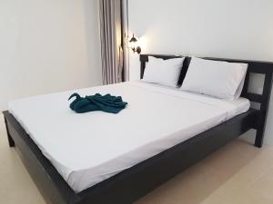 Postel nebo postele na pokoji v ubytování Talent Resort