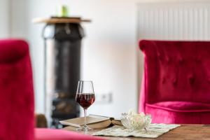 Posezení v ubytování OSTLAND LOFT im INSEL-LAND-HOTEL MICHAELSEN