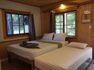 Voodi või voodid majutusasutuse Big Fish Resort Koh Tao toas