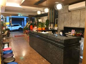 金城Aimei商務旅館的厨房或小厨房