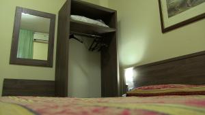 Letto o letti in una camera di Hotel Due Pini