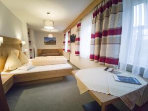 Letto o letti in una camera di Gästehaus Panorama