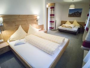 Letto o letti in una camera di Gästehaus Panorama