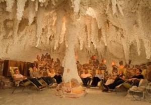 a group of people sitting in chairs in a cave at Fewo am Kurpark in Bad Sassendorf
