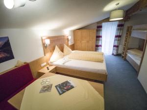 Letto o letti in una camera di Gästehaus Panorama