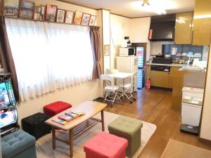 Ein Sitzbereich in der Unterkunft Tiny GuestHouse Umekoji 梅小路