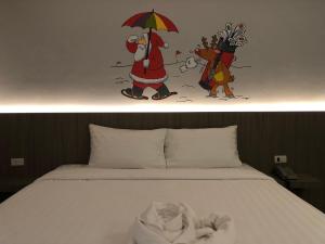 Cama ou camas em um quarto em Paramount Palace Hotel Dannok