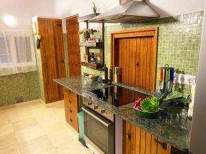 A kitchen or kitchenette at Casa Puput