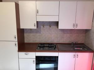 Køkken eller tekøkken på Viale Umberto I Apartments + 18 billeder