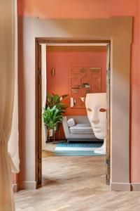 A bed or beds in a room at Luxury Trevi House