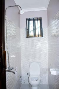Koupelna v ubytování Wanyama B&B