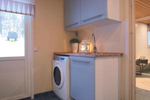 Kuchyň nebo kuchyňský kout v ubytování RIBO Apartment Aurora