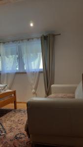 Posezení v ubytování Traumhafte Ferienwohnung mit Pool