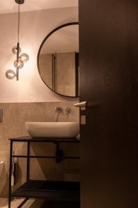 Koupelna v ubytování Burgus - Design Suites & Apartments