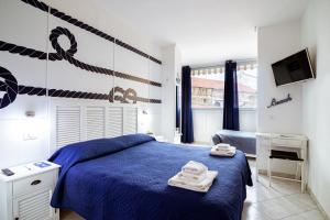 Posteľ alebo postele v izbe v ubytovaní "6 in centro" guest house