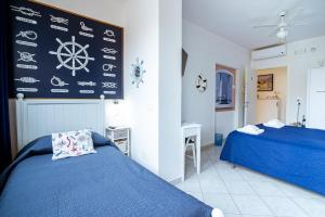 Posteľ alebo postele v izbe v ubytovaní "6 in centro" guest house