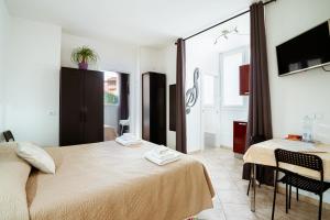 Posteľ alebo postele v izbe v ubytovaní "6 in centro" guest house