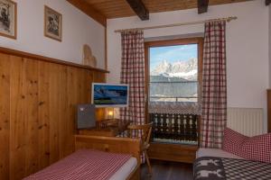 TV a/nebo společenská místnost v ubytování Rücklhof