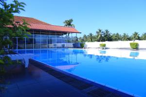 a view of the pool at the resort at PJ Hotels Jaffna in Jaffna