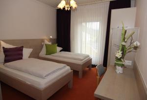 Кровать или кровати в номере Gasthof Torwirt