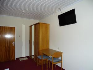 Телевизор и/или развлекательный центр в Gasthof Torwirt