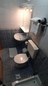 Kylpyhuone majoituspaikassa Vuković House
