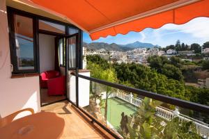 a view from the balcony of a house at Hostal Casa Mercedes in Nerja