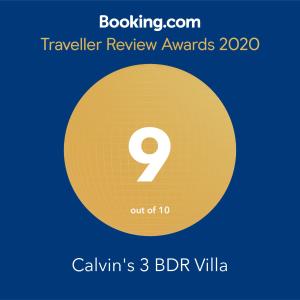 um círculo amarelo com o número nove com os prémios de avaliação de viagem de texto em Calvin's 3 BDR Villa em Benaulim