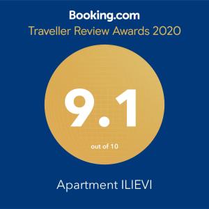 żółty okrąg z numerem dziewięć i nagrody za ocenę podróżowania tekstu w obiekcie Apartment ILIEVI w mieście Plewen