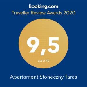 Certyfikat, podpis lub inny dokument wystawiony w obiekcie Baltic Apartments - Apartament Słoneczny Taras