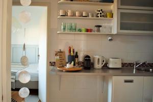 A kitchen or kitchenette at Gellért Hill Apartment Még 37 kép