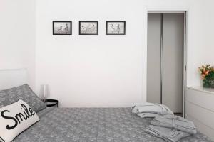 Postel nebo postele na pokoji v ubytování Stupendo e accogliente apt (15 min dal Duomo)