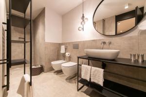 Koupelna v ubytování Burgus - Design Suites & Apartments