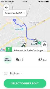 une capture d'écran d'un téléphone portable avec une carte dans l'établissement Apartment Tunis 2 Near airport, à Ariana